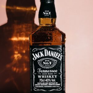 a bottle of jack daniels whiskey sitting on a table
