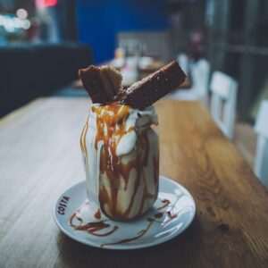 beverage topped with pastry